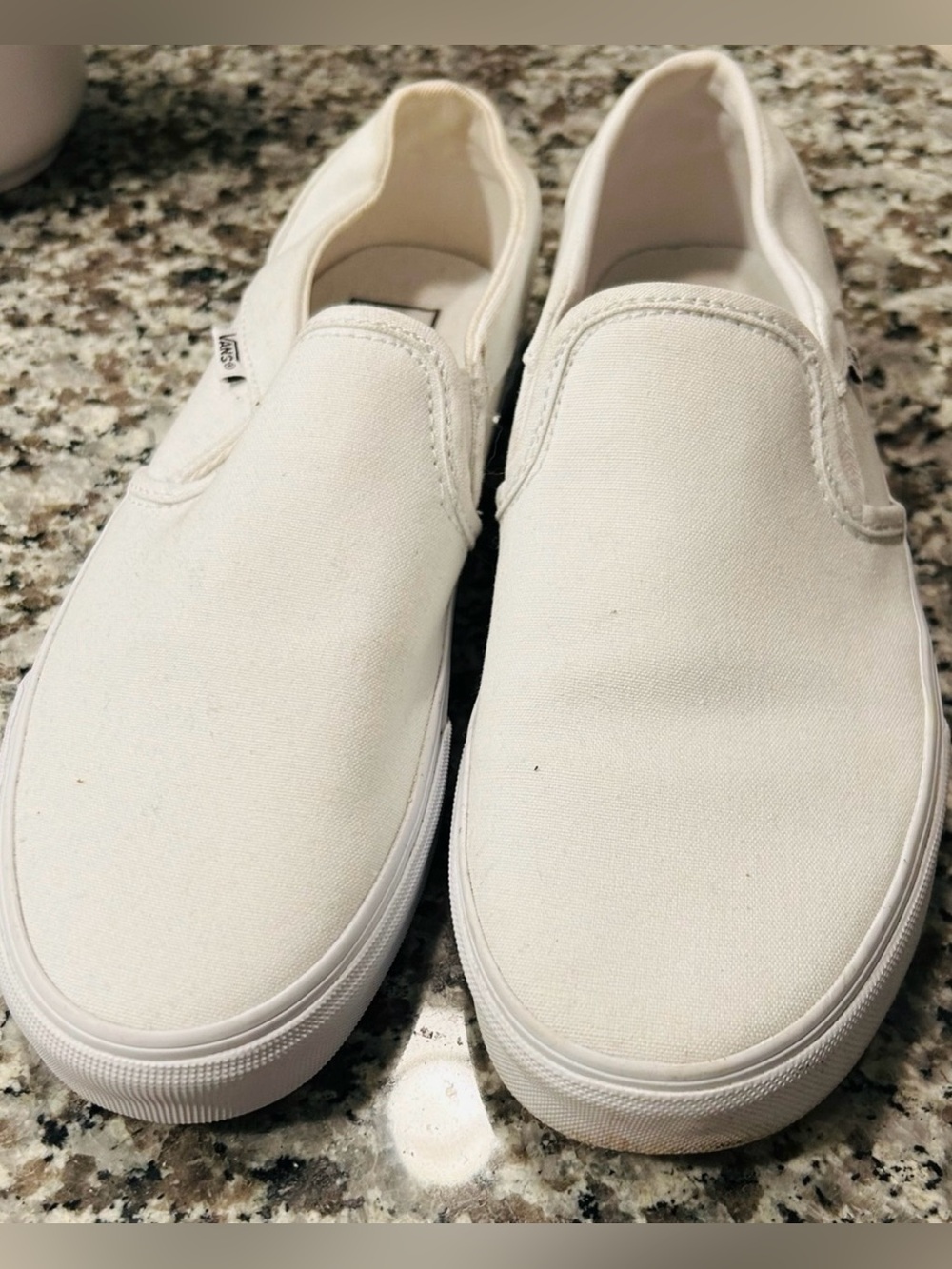 Vans White Canvas Slip-On Sneakers